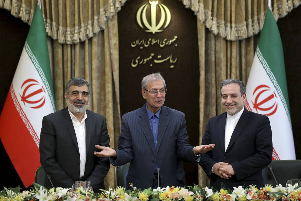 From left to right, spokesman for Iran's atomic agency Behrouz Kamalvandi, Iran's government sp ...