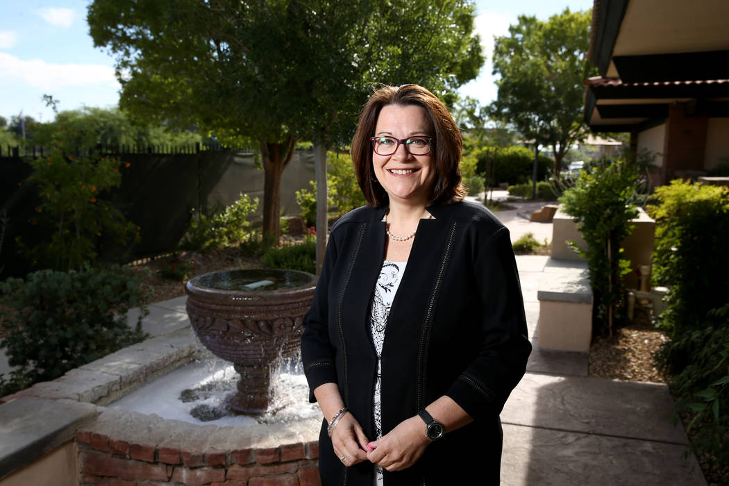 Nathan Adelson Hospice President and CEO Karen Rubel in the hospice's Healing Garden in Las Veg ...