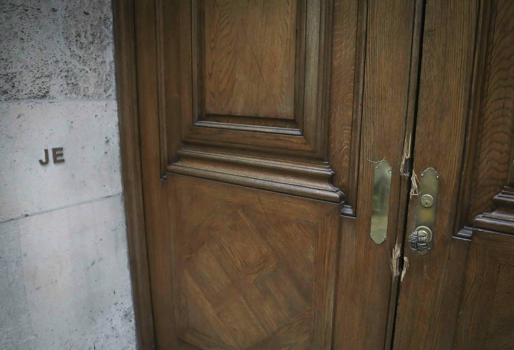 The initials "JE" and doorway damage at the Manhattan residence of Jeffrey Epstein, Monday July ...