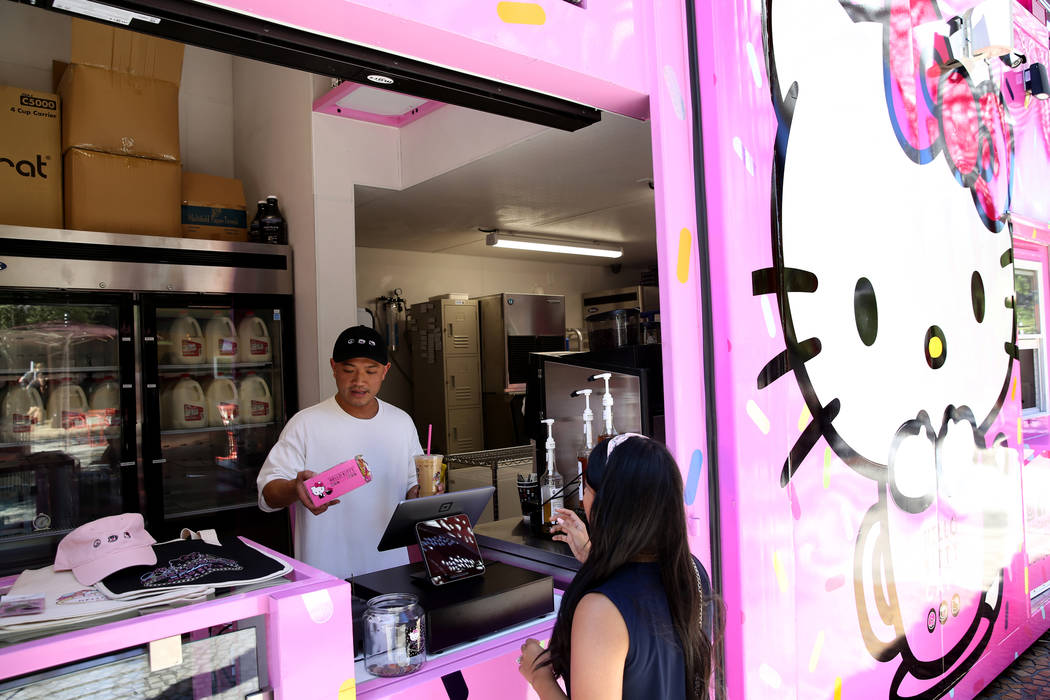 Hello Kitty Cafe owner Polo Nguyen, left, and Business Development Coordinator Melissa Paez dur ...