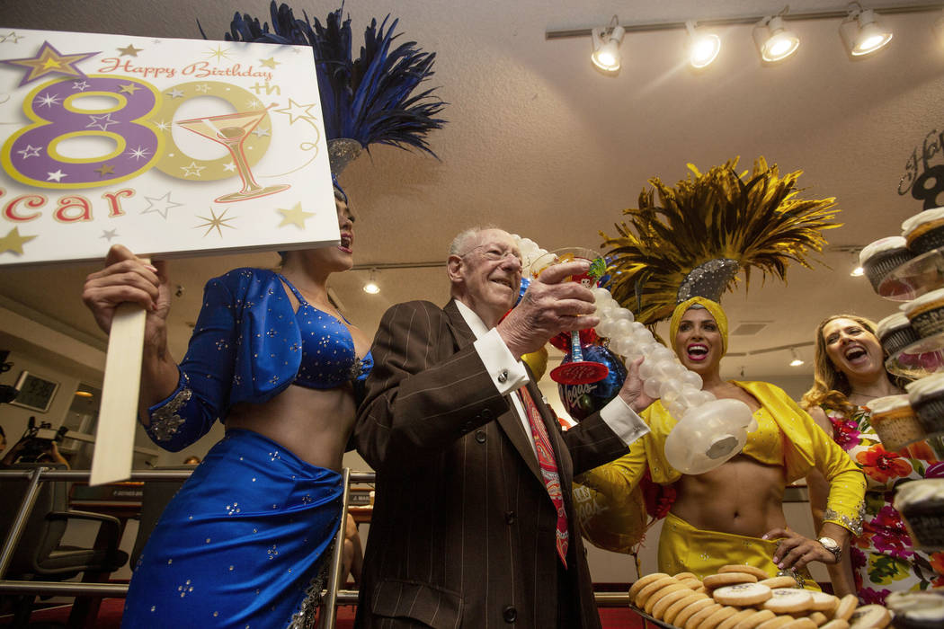 Former Las Vegas Mayor Oscar Goodman celebrates his 80th birthday with showgirls Porsha Revesz, ...