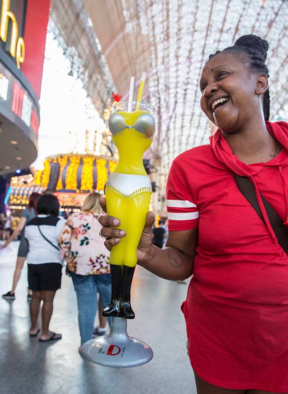 Nina Taylor holds a banana margarita from D Bar on Friday, July 5, 2019, at the Fremont Street ...