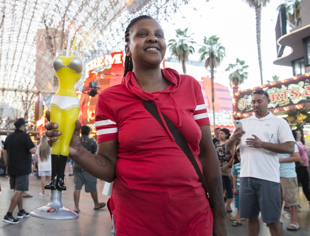 Nina Taylor holds a banana margarita from D Bar on Friday, July 5, 2019, at the Fremont Street ...