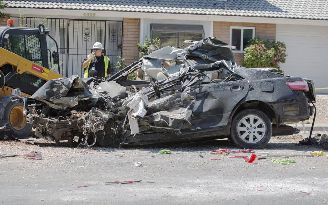 The scene of a fatal crash on West Washington Avenue near Decatur Boulevard on Tuesday, July 9, ...