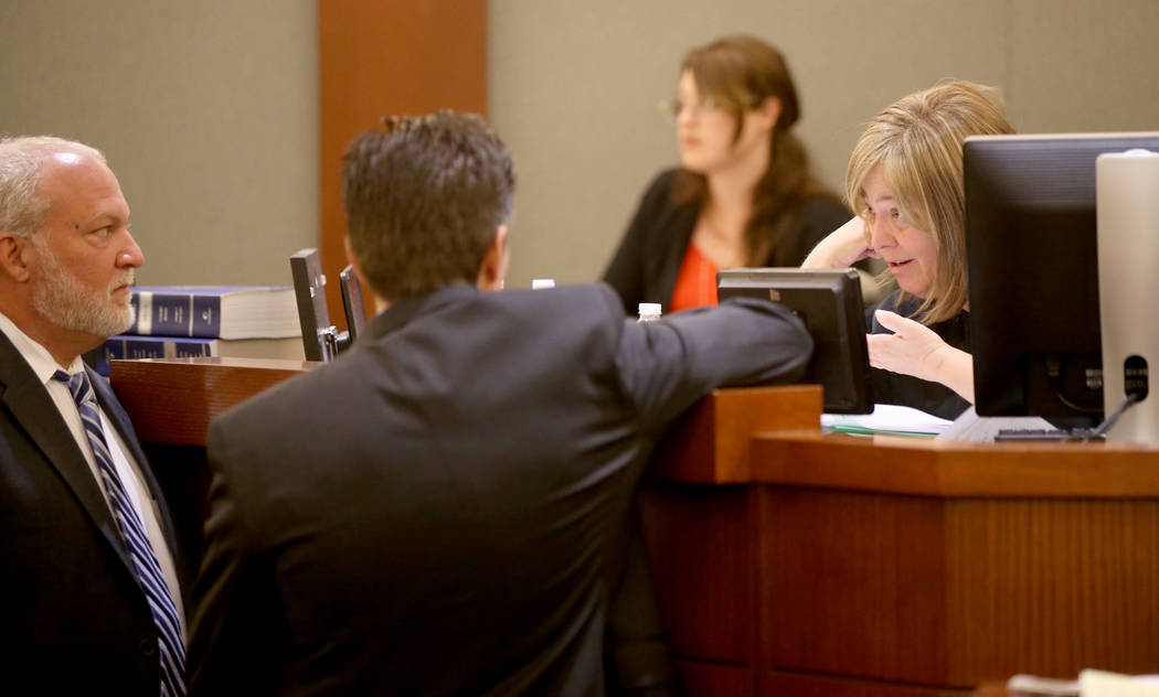 Abel Yanez, attorney for Christopher J. Weygant II, center, and Chief Deputy District Attorney ...