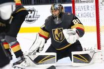 Golden Knights goaltender Marc-Andre Fleury (29) defends the net during an NHL hockey game agai ...