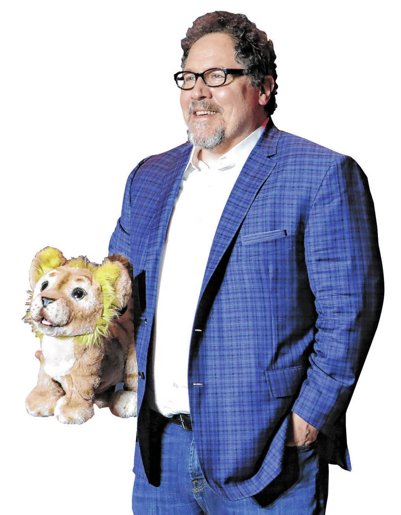 Director Jon Favreau poses during a press conference to promote his film, "The Lion King&q ...