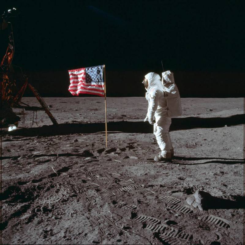 Astronaut Buzz Aldrin Jr. poses for a photograph beside the U.S. flag on the moon during the Ap ...