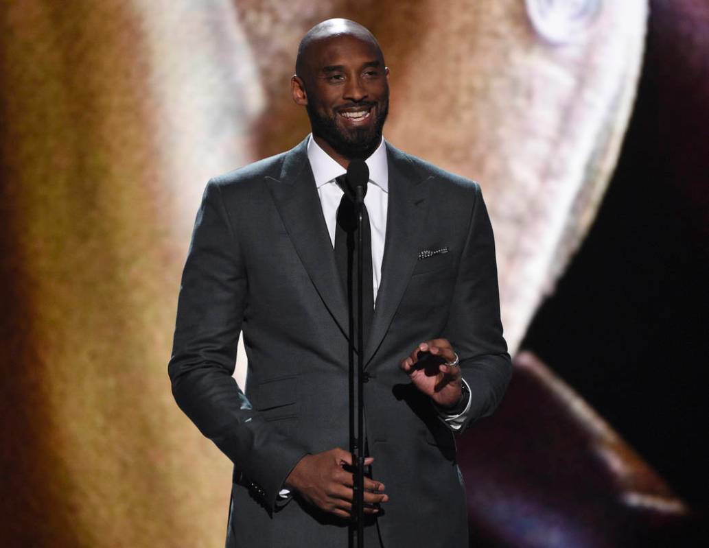 Kobe Bryant present the Arthur Ashe award for courage at the ESPY Awards on Wednesday, July 10, ...