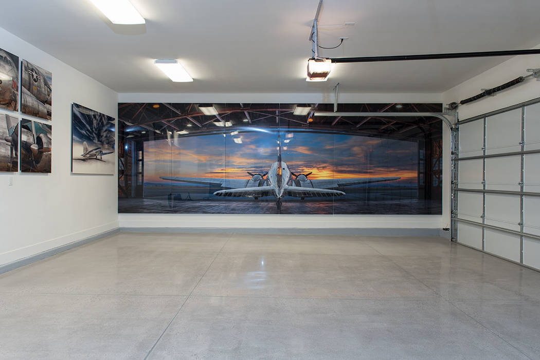 Even the garage in the luxury home features Peter Lik's photography. (Jewel Homes)