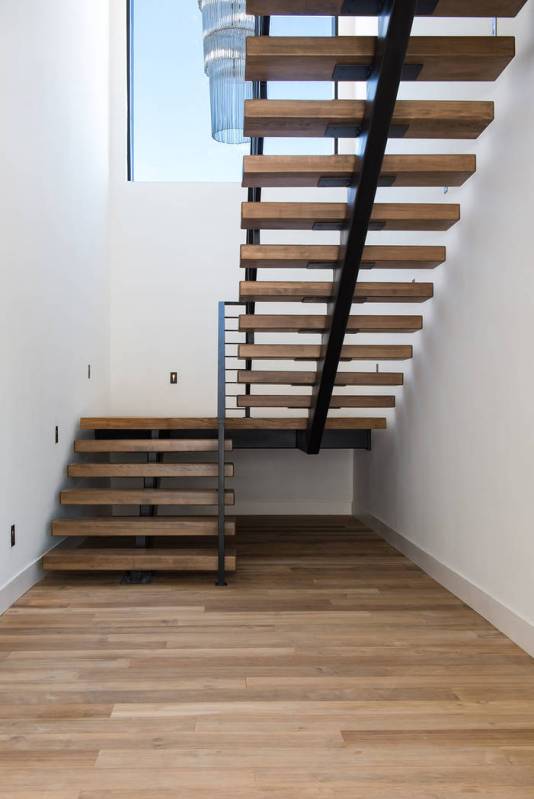 The home features a floating staircase. (Jewel Homes)
