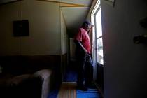 In this photo taken Wednesday, May 29, 2019, resident James Lesane stands at the entrance to hi ...