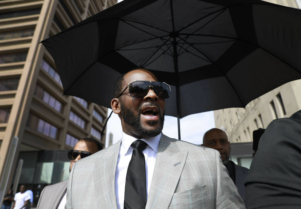 FILE - In this June 6, 2019 file photo, musician R. Kelly departs the Leighton Criminal Court ...