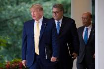 President Donald Trump arrives with Commerce Secretary Wilbur Ross and Attorney General William ...