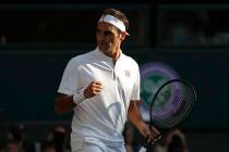 Switzerland's Roger Federer celebrates winning a point against Spain's Rafael Nadal during a me ...