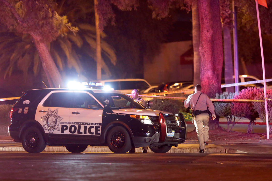 Las Vegas police investigate an officer-involved shooting near an apartment complex in the 5300 ...