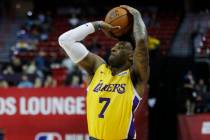 Los Angeles Lakers' Jordan Caroline plays against the New York Knicks during an NBA summer leag ...