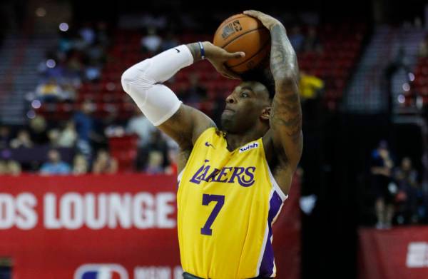 Los Angeles Lakers' Jordan Caroline plays against the New York Knicks during an NBA summer leag ...