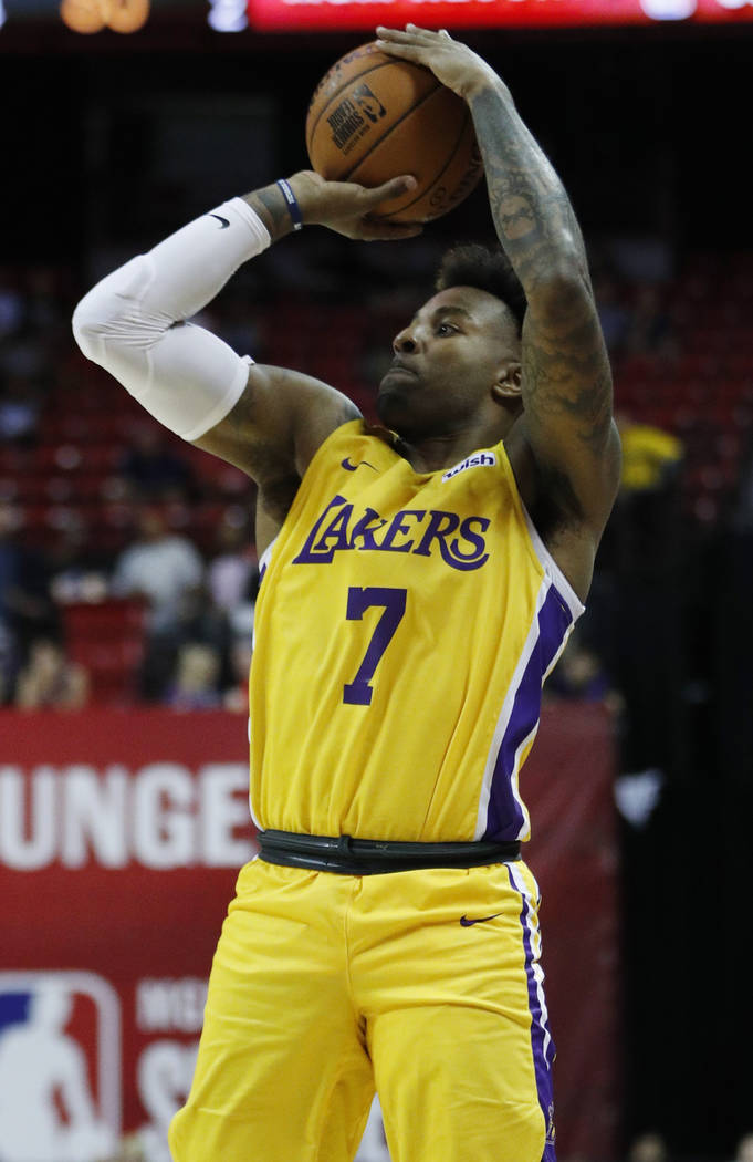 Los Angeles Lakers' Jordan Caroline plays against the New York Knicks during an NBA summer leag ...