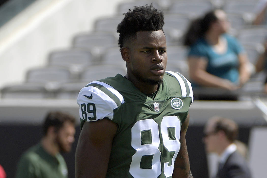 In this Sept.30, 2018, file photo, New York Jets tight end Chris Herndon warms up before an NFL ...
