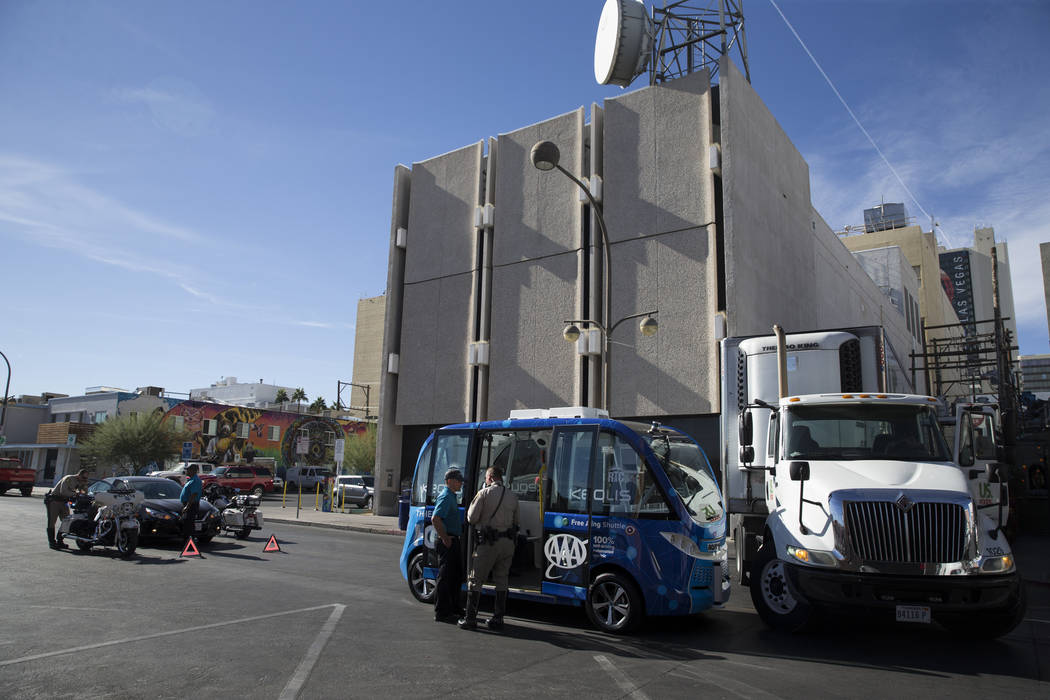 The scene of an accident between a truck and a driverless electric shuttle near Fremont Street ...