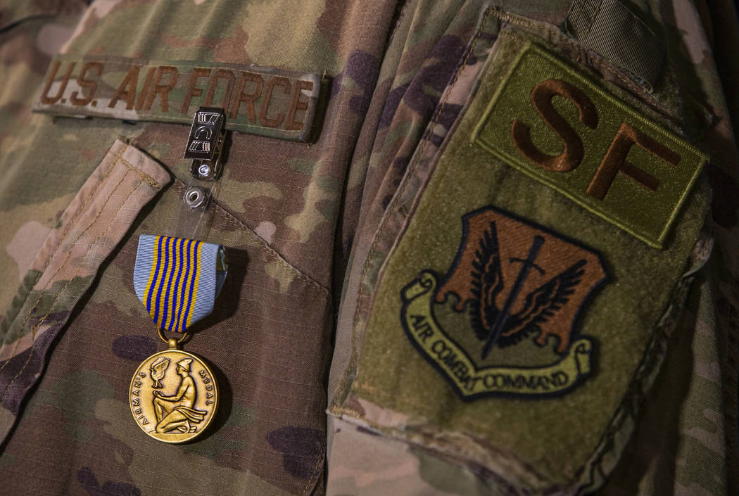Staff Sgt. Kenneth DeLongchamp wears his new Airman's Medal at Nellis Air Force Base on Friday, ...