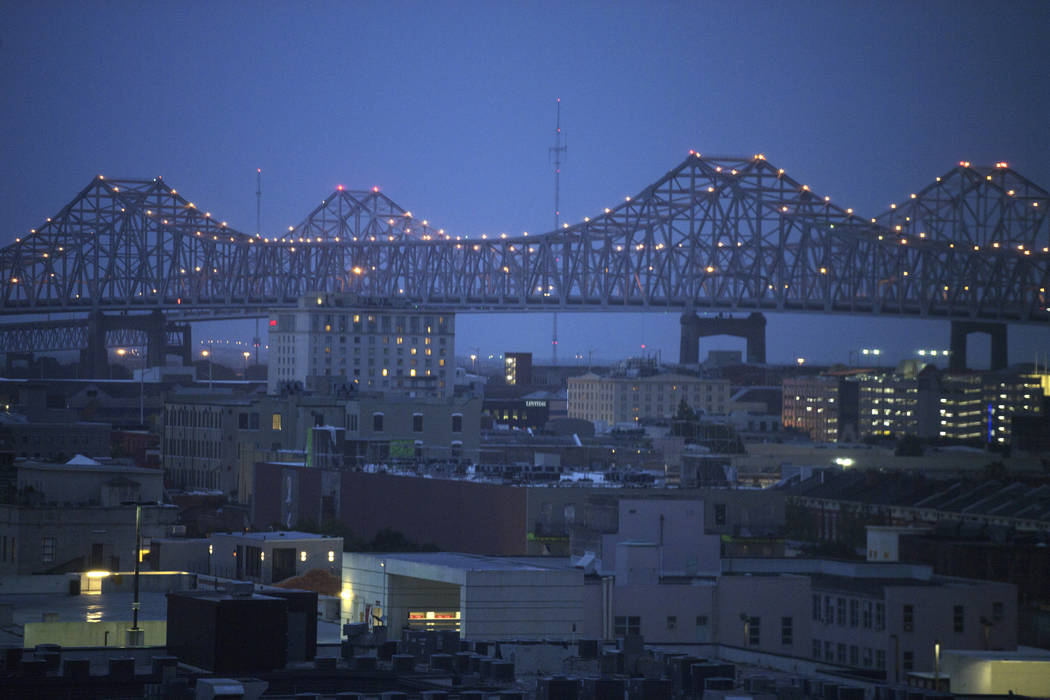 Clouds are seen over the Crescent City Connection bridge at dawn as Tropical Storm Barry approa ...