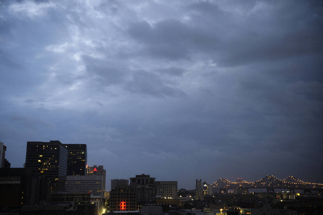 Clouds are seen over the Central Business District at dawn as Tropical Storm Barry approaches i ...