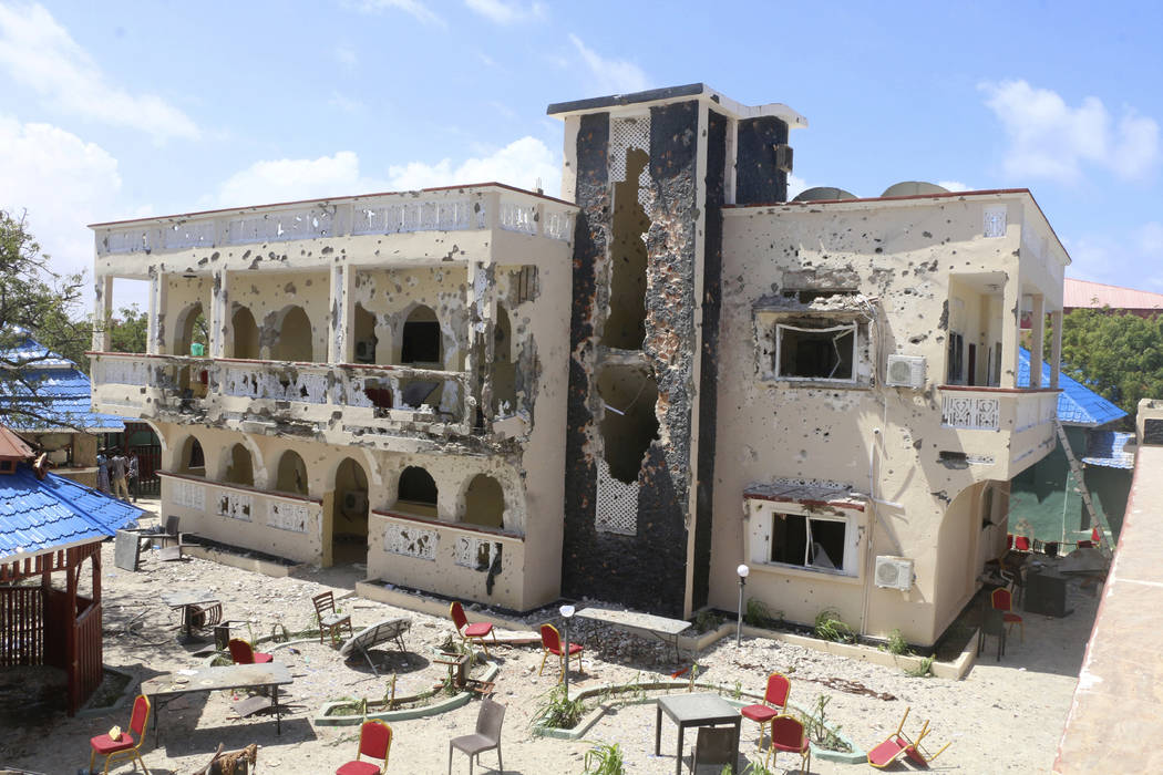 A view of Asasey Hotel after an attack, in Kismayo , Somalia, Saturday July 13, 2019. At least ...