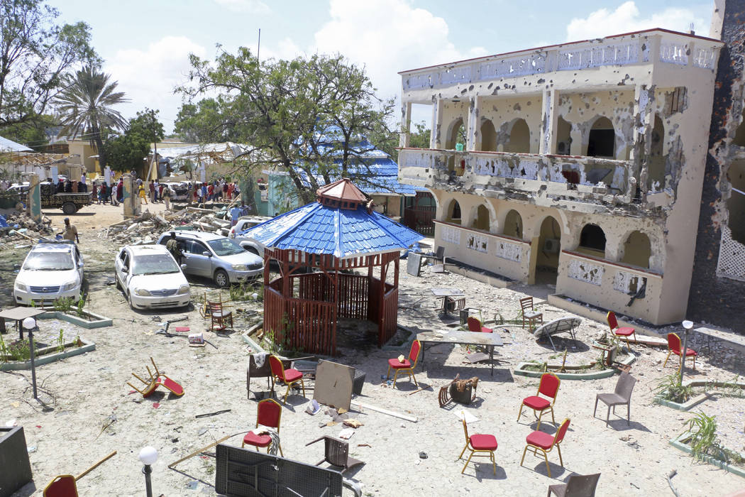 A view of Asasey Hotel after an attack, in Kismayo , Somalia, Saturday July 13, 2019. At least ...