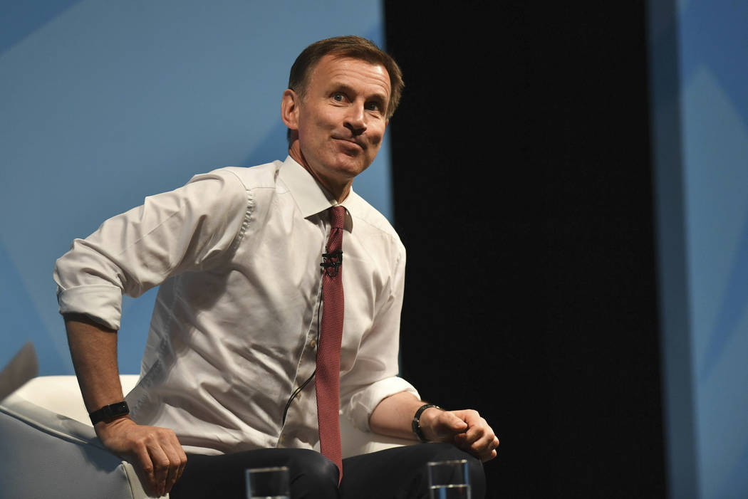 Conservative Party leadership candidate Jeremy Hunt gestures, during a Conservative Party leade ...