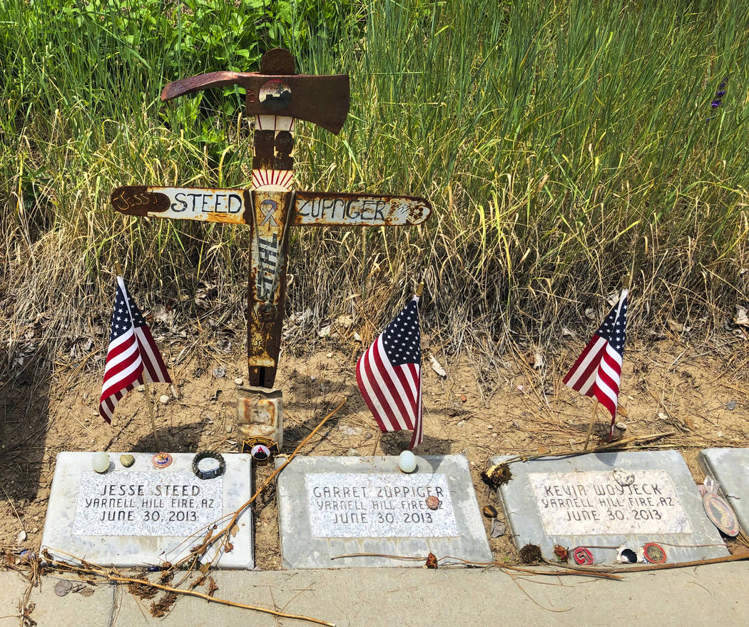 This June 3, 2019 photo shows memorial stones at the Wildland Firefighters Monument at the Nati ...