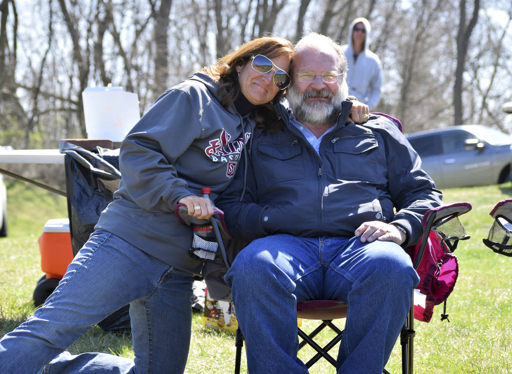 In this April, 2016 photo, Stacey Chaney and her brother Shane Del Grosso enjoy a moment togeth ...