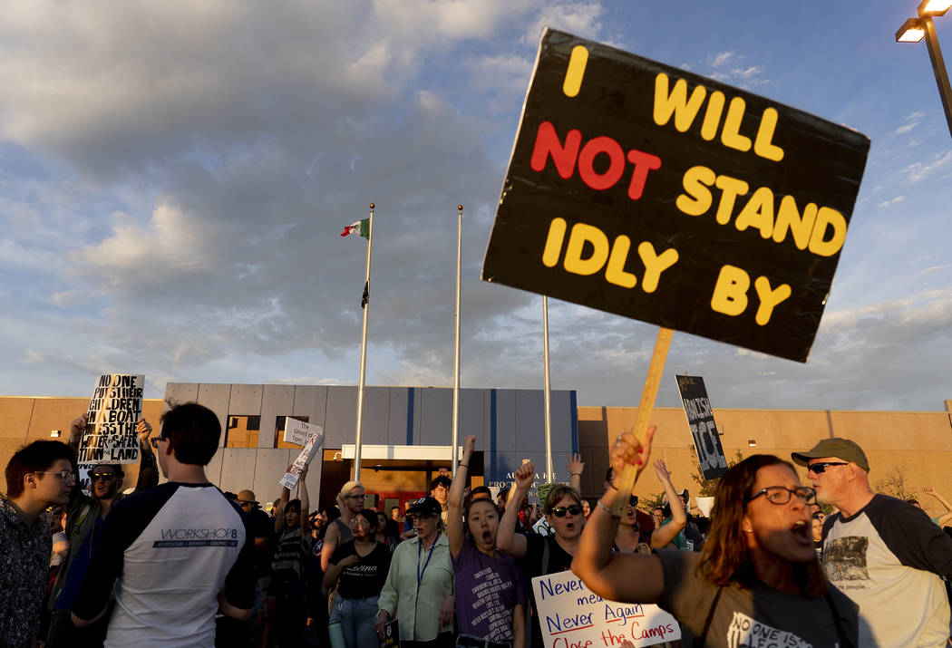 In this Friday, July 12, 2019, photo, protesters who crossed the threshold onto GEO property ye ...