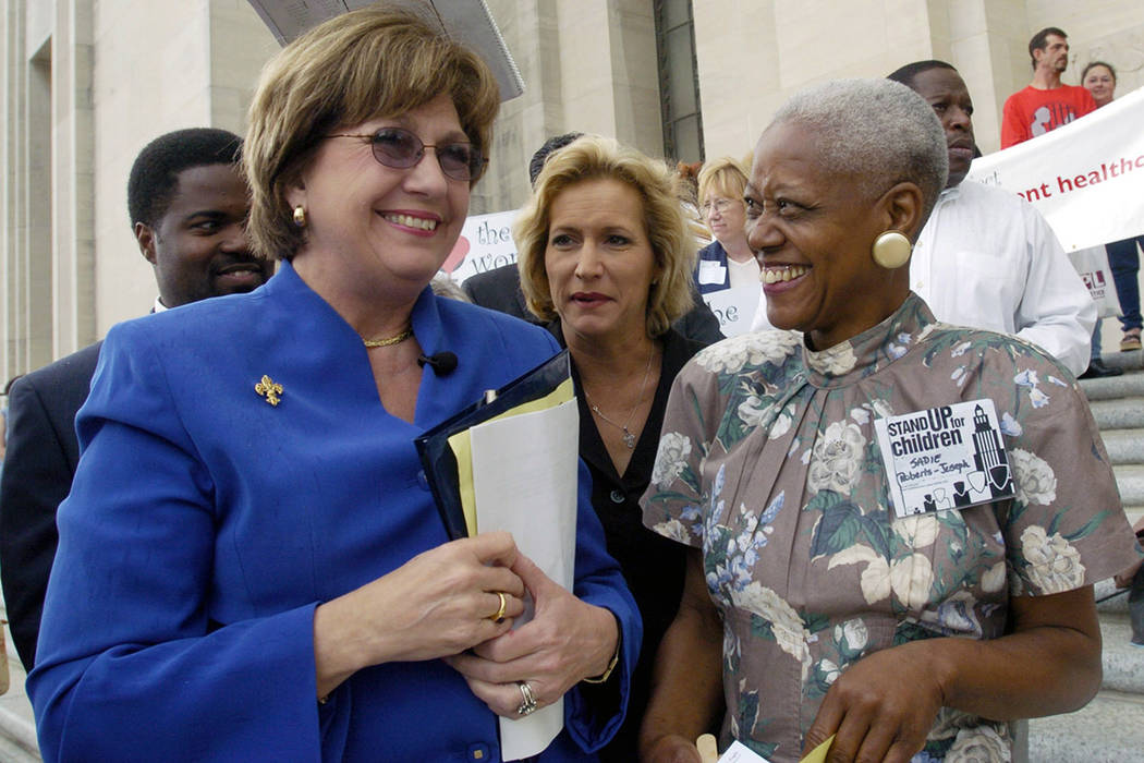 FILE - In this April 20, 2004 file photo, Rep. Carla Blanchard Dartez, D-Morgan City, center co ...