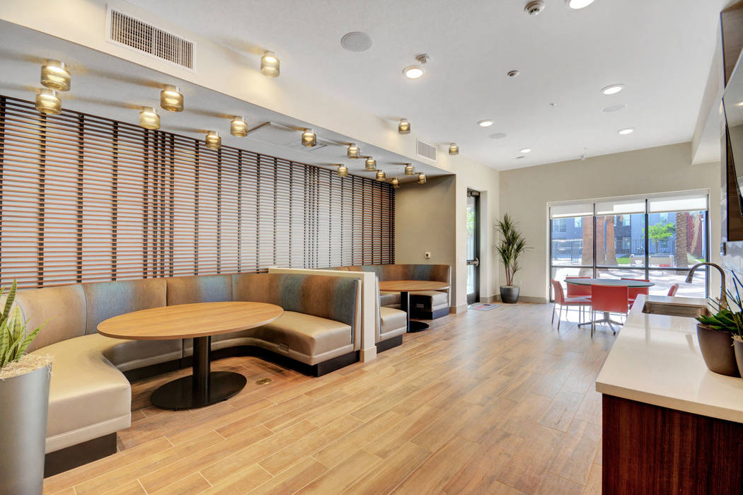 The Degree features a modern lobby with a lounge. (The Midby Cos.)