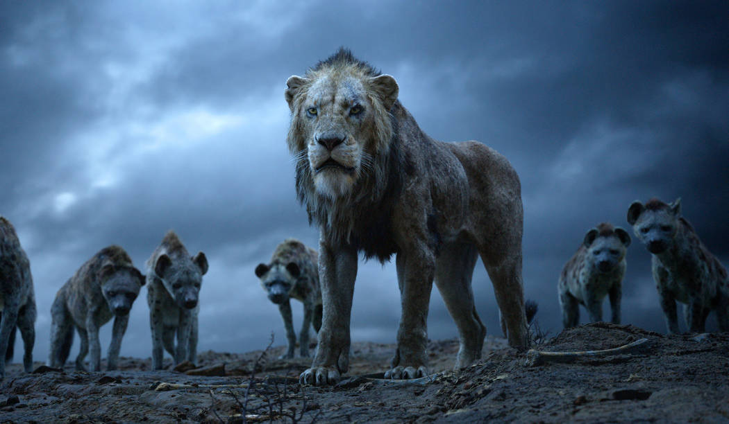 This image released by Disney shows Scar, voiced by Chiwetel Ejiofor, in a scene from "The Lion ...