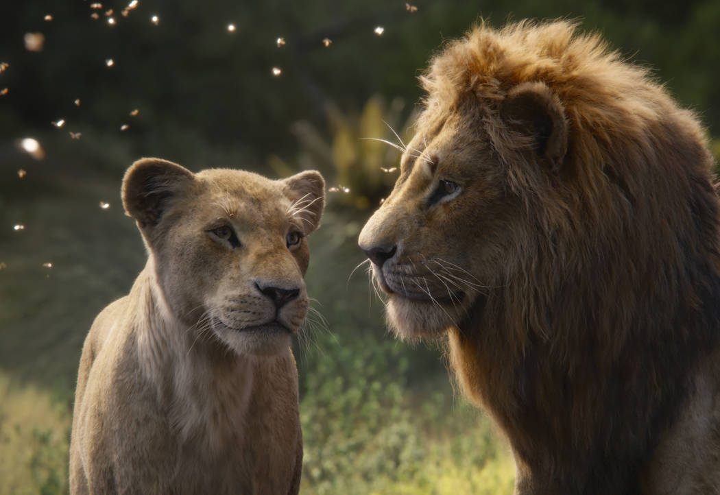 This image released by Disney shows Nala, voiced by Beyoncé Knowles-Carter, left, and Simb ...