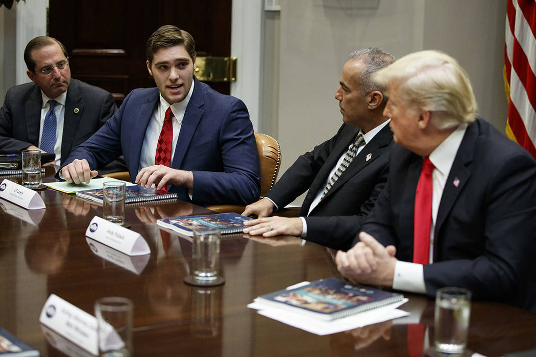 JT Lewis, brother of Sandy Hook victim Jesse Lewis, speaks to President Donald Trump during a r ...