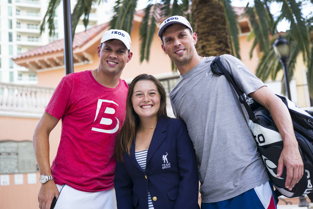 Cherrial Odell, center, poses for a portrait with Bob Bryan, left, and Mike Bryan after a tenni ...