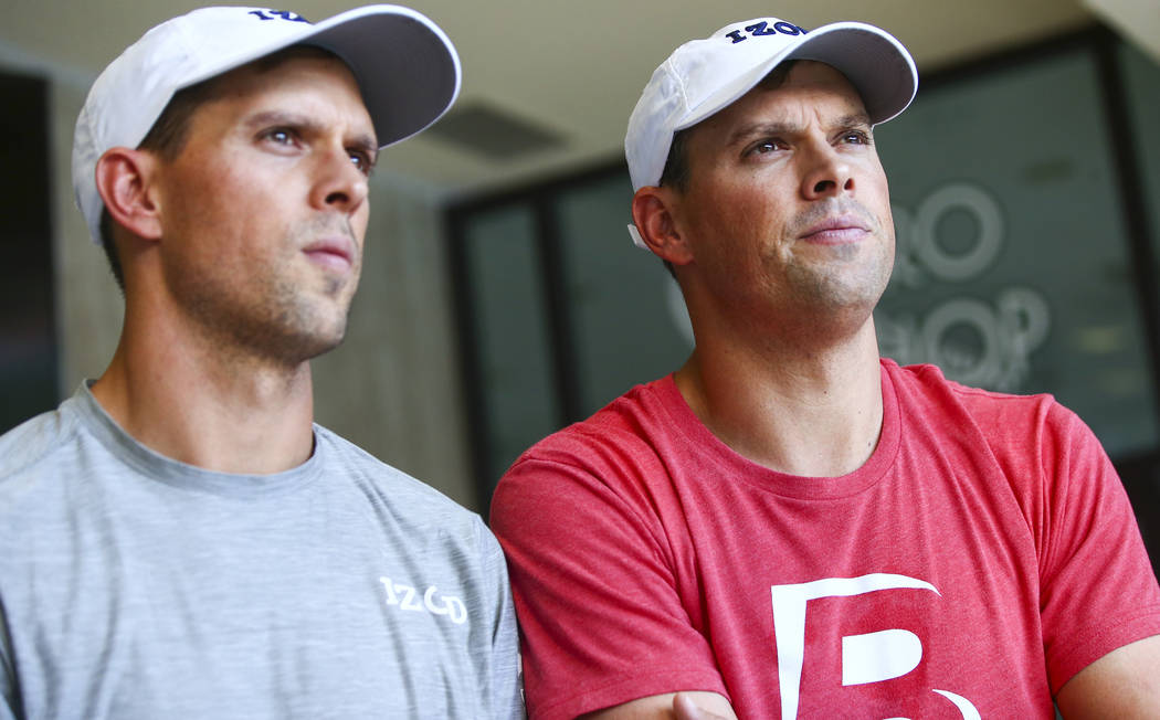 Mike Bryan, left, and Bob Bryan talk about Cherrial Odell, a local amatuer tennis player that t ...