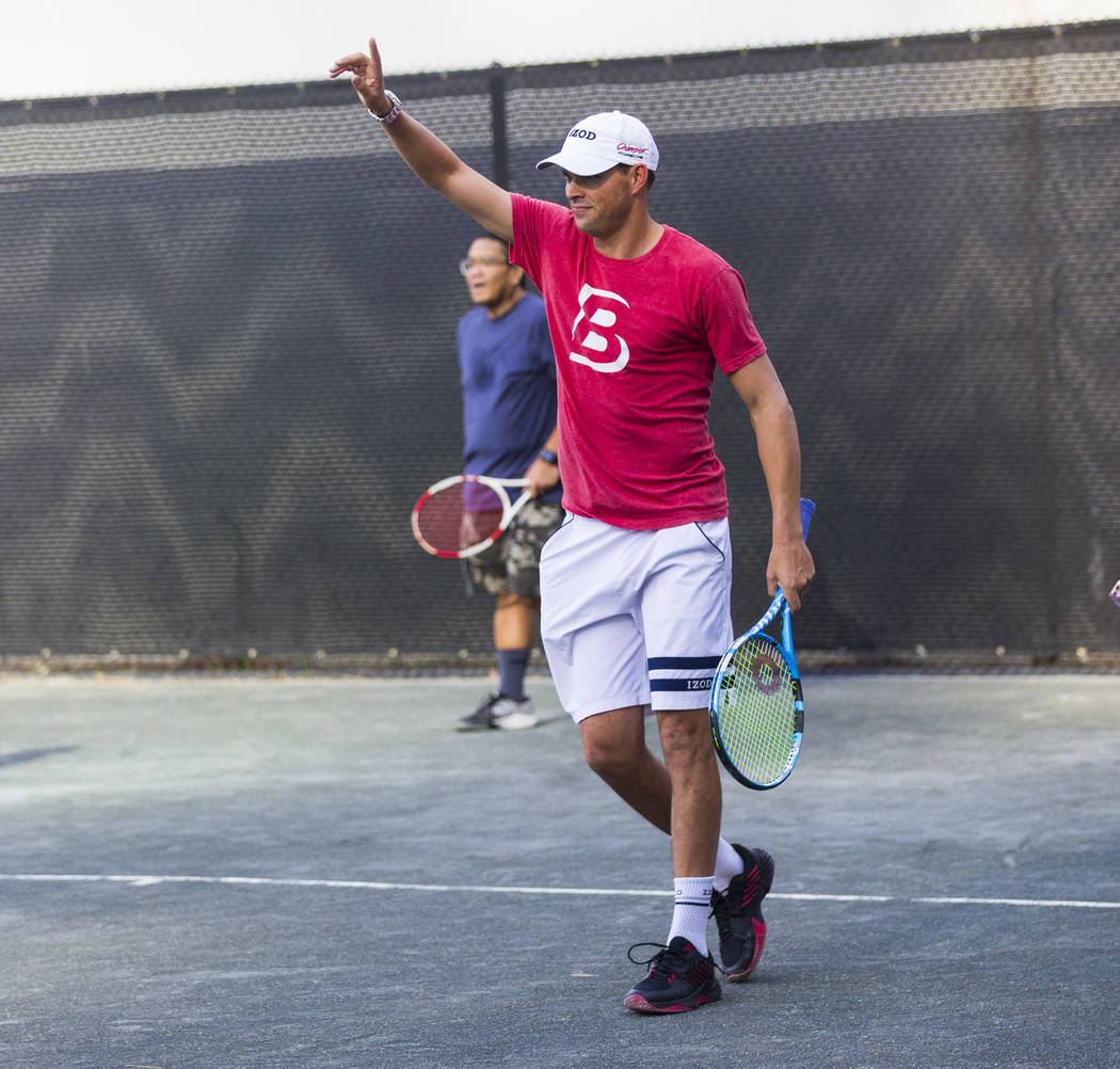 Bob Bryan helps lead a tennis clinic held at the Stirling Club at Turnberry Place in Las Vegas ...
