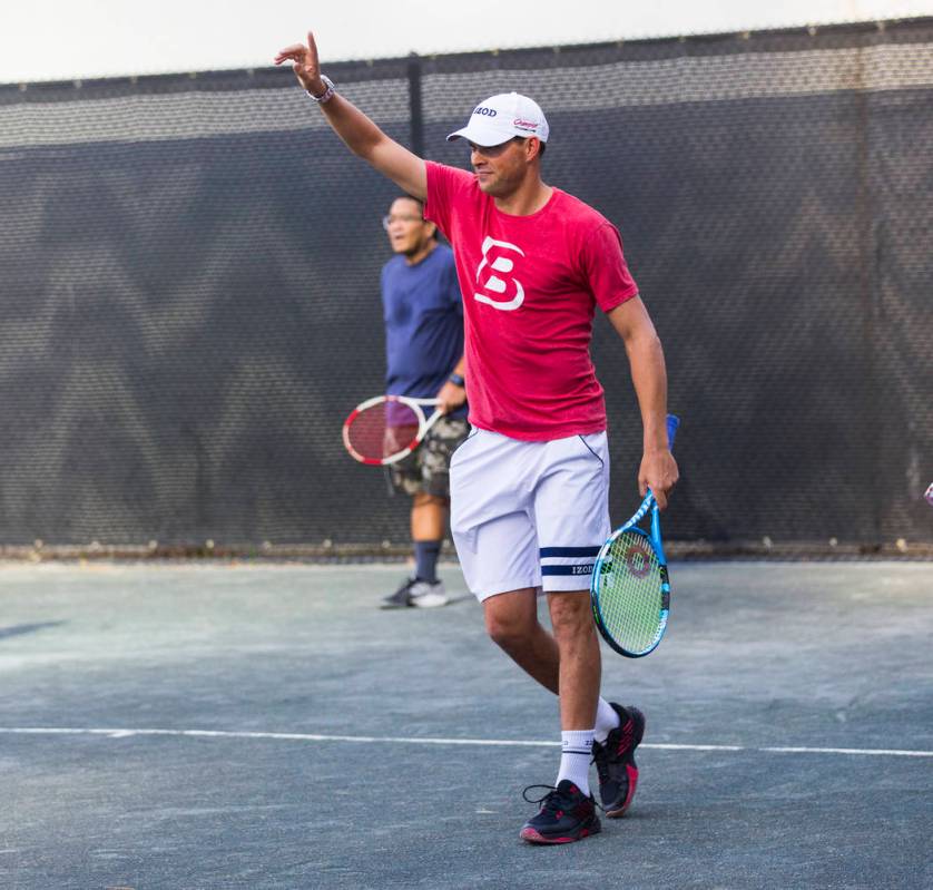 Bob Bryan helps lead a tennis clinic held at the Stirling Club at Turnberry Place in Las Vegas ...