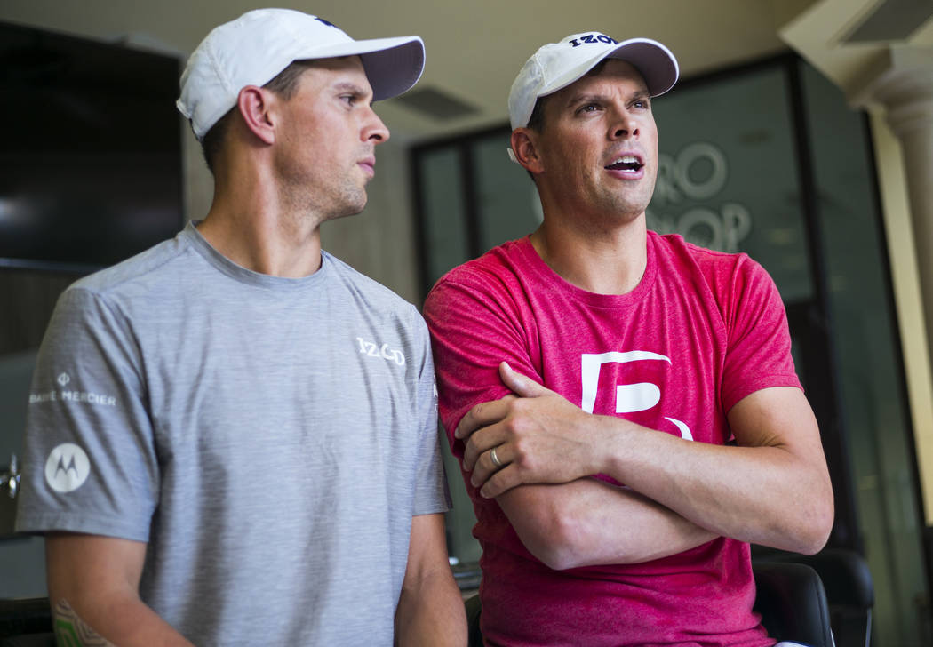 Mike Bryan, left, and Bob Bryan talk about Cherrial Odell, a local amatuer tennis player that t ...