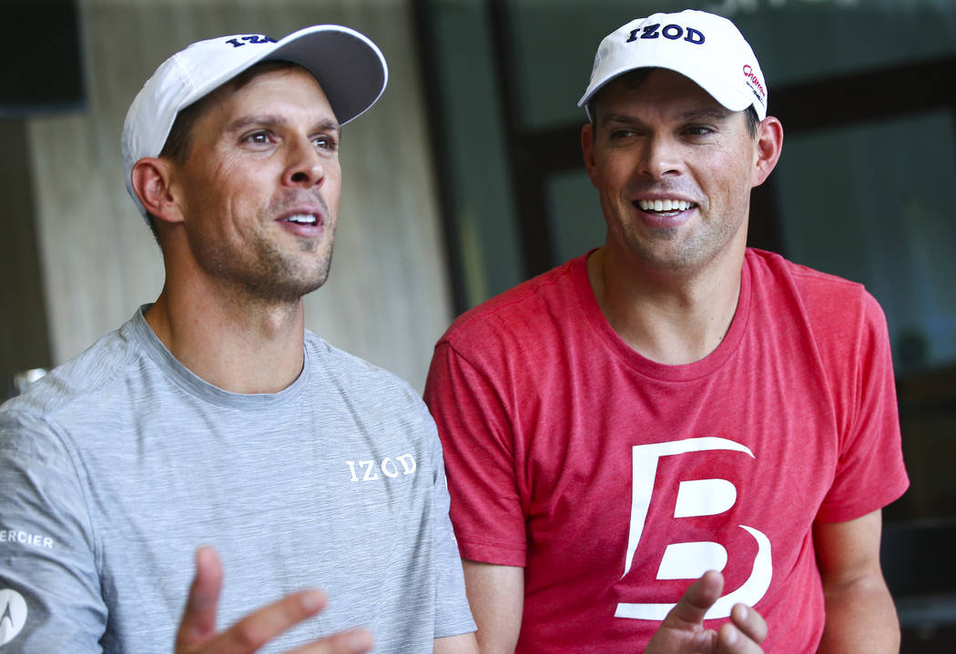 Mike Bryan, left, and Bob Bryan talk about Cherrial Odell, a local amatuer tennis player that t ...