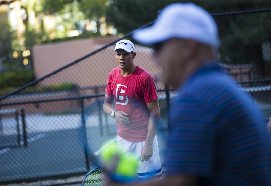 Bob Bryan helps lead a tennis clinic held at the Stirling Club at Turnberry Place in Las Vegas ...