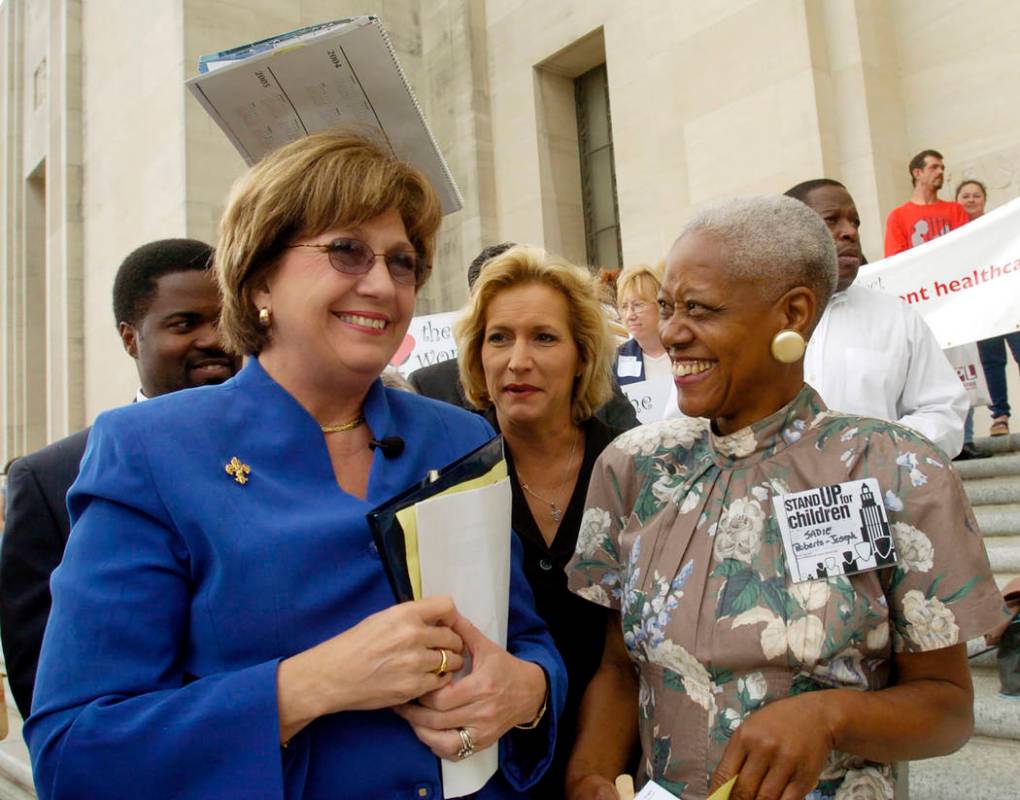 FILE - In an April 2004 file photo, Gov. Kathleen Blanco, left, talks with Sadie Roberts-Joseph ...