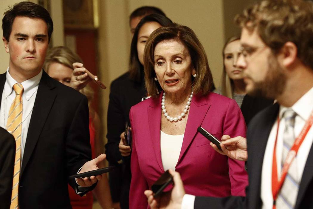 House Speaker Nancy Pelosi, D-Calif., walks to the House Chamber, Tuesday, July 16, 2019, on Ca ...