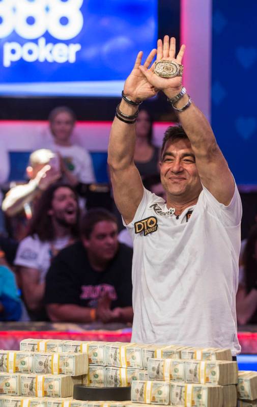 Hossein Ensan, from Germany, celebrates after winning the World Series of Poker Main Event on W ...