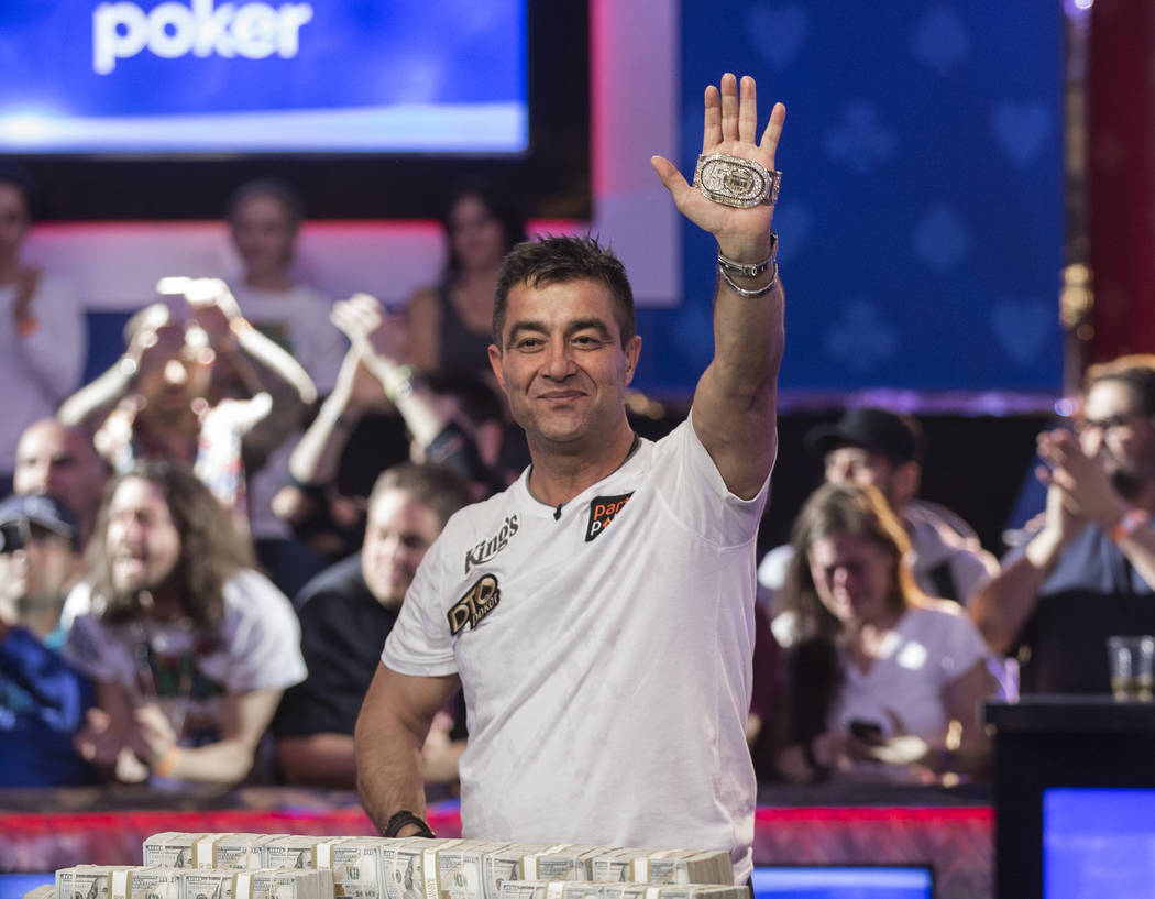 Hossein Ensan, from Germany, celebrates after winning the World Series of Poker Main Event on W ...